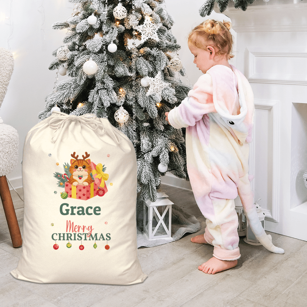 Child discovering gifts in Personalised Santa Sack – Christmas Present Cat
 design