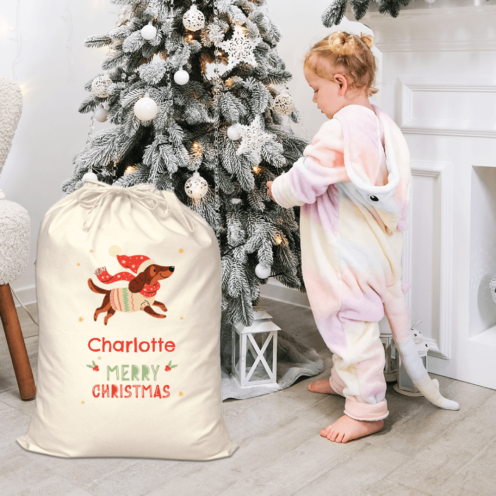 Child discovering gifts in Personalised Santa Sack – Christmas Sausage Dog
 design