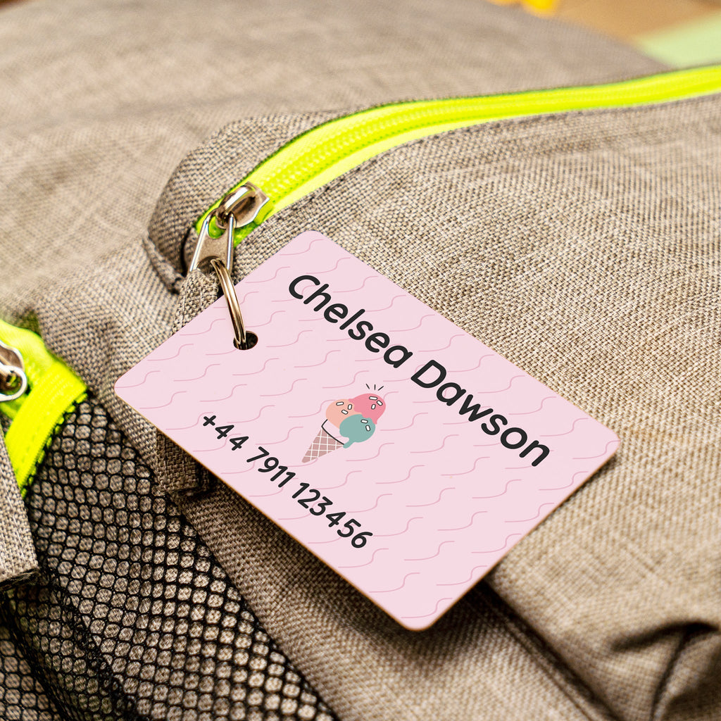 summer themed bag tag on a school bag backpack